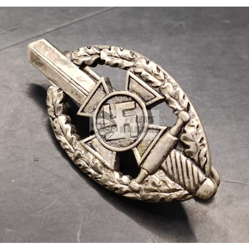 NSKOV – National Socialist War Victims’ Relief Organization.